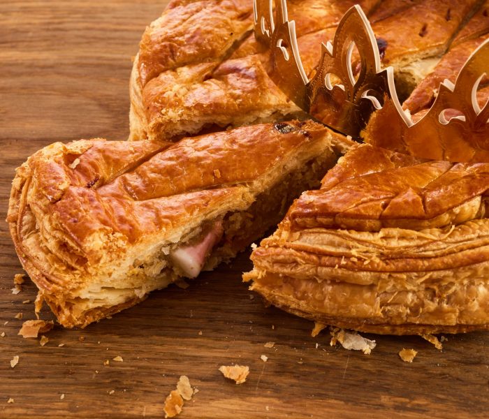 Galette des rois on wooden table.Traditional Epiphany cake in France