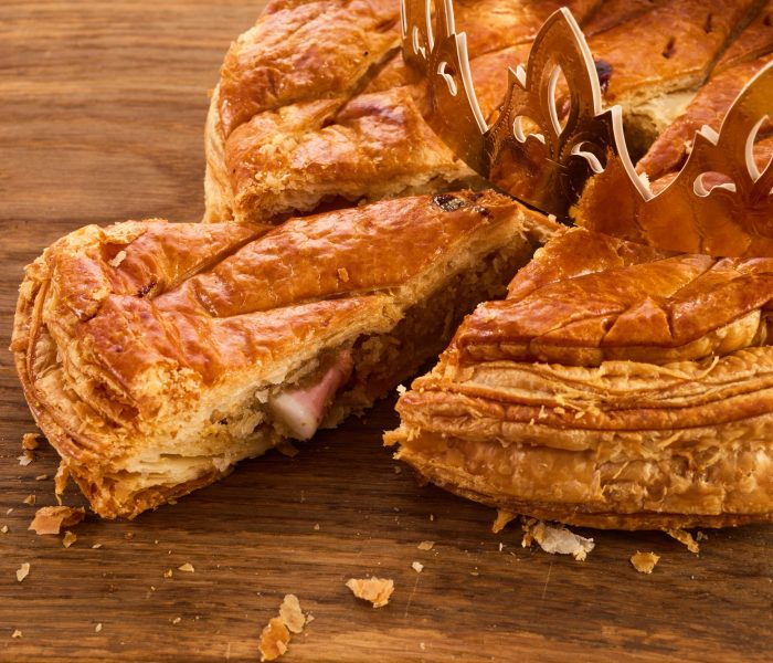 Galette des rois on wooden table.Traditional Epiphany cake in France